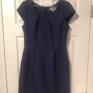 A Black & Purple Polkadot Dress